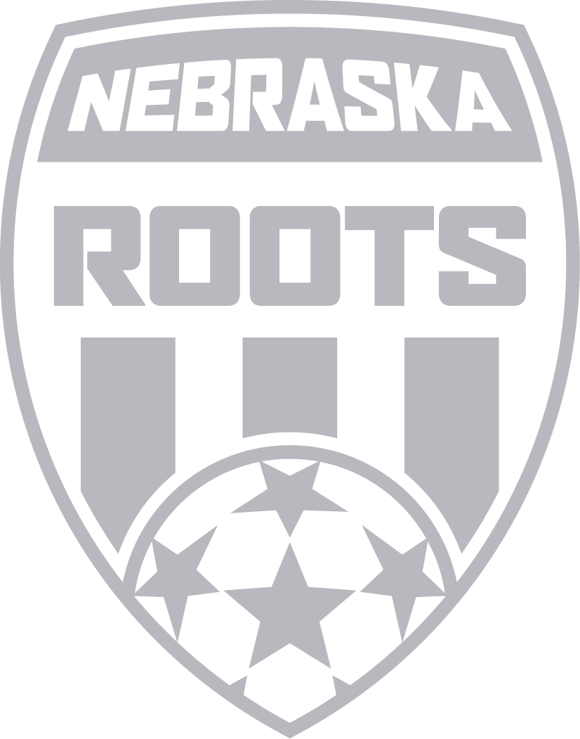 Monochrome shield-shaped logo featuring the text "NEBRASKA ROOTS" above vertical stripes and a stylized soccer ball patterned with stars.