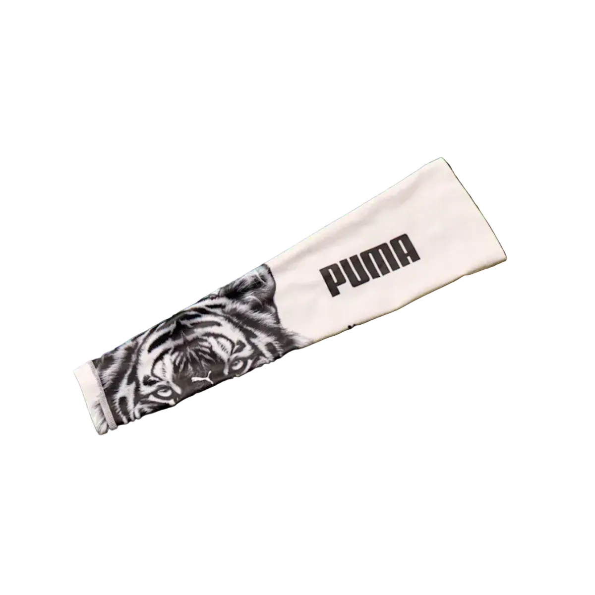 White PUMA arm sleeve featuring a bold black logo and a realistic graphic print of a white tiger's face.