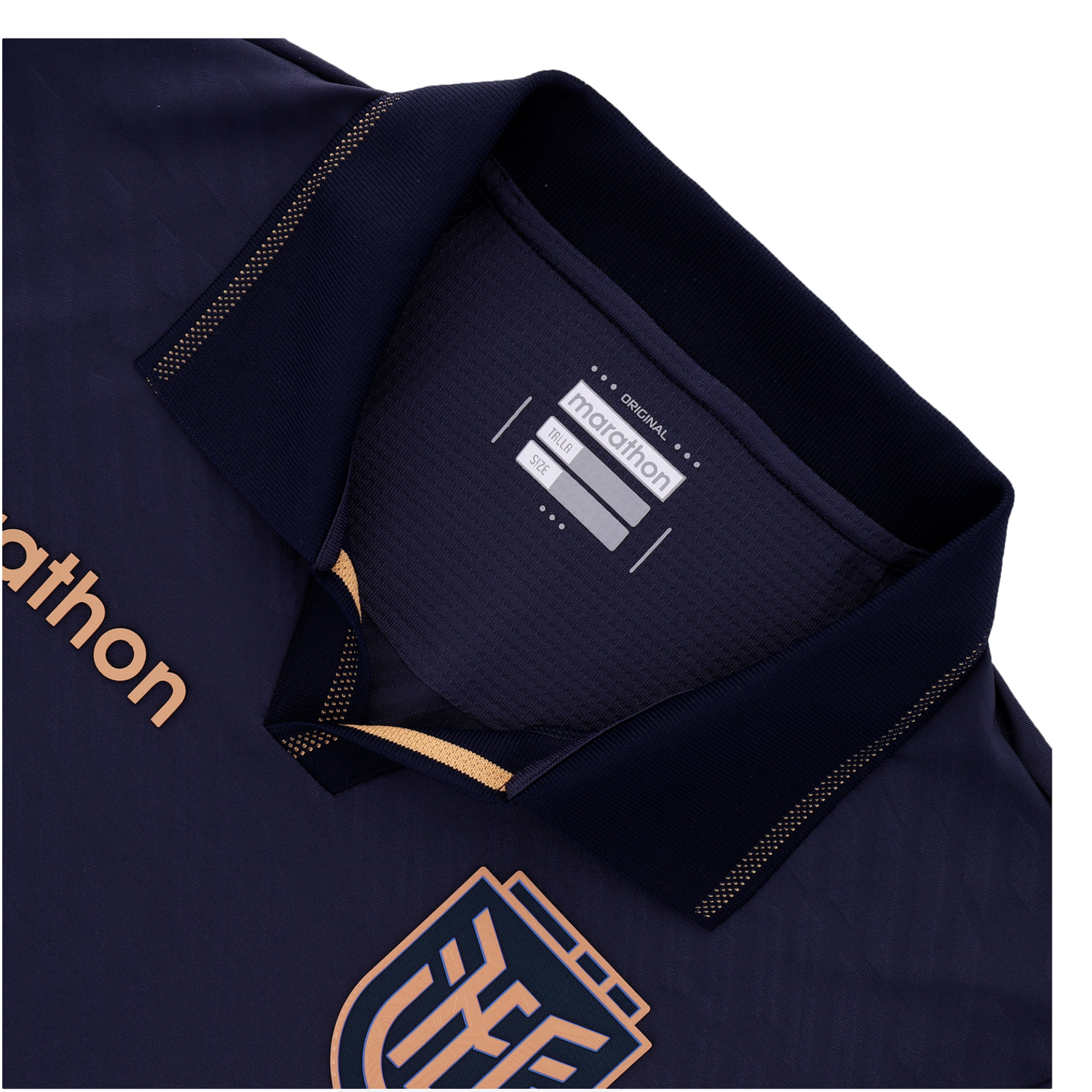 A close-up of the neck and upper chest area of a navy blue sports jersey. The jersey features a ribbed polo collar with gold dotted trim, a silver Marathon brand label heat-pressed inside the neck, and a large gold and navy FEF (Ecuadorian Football Federation) crest on the lower chest.