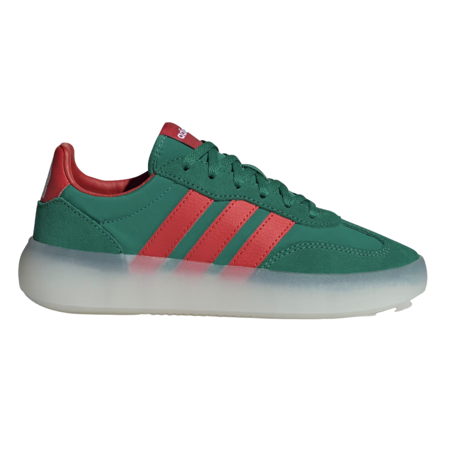 A low-top Adidas sneaker with a dark green upper, three red stripes, and a thick, translucent white platform sole against a black background.