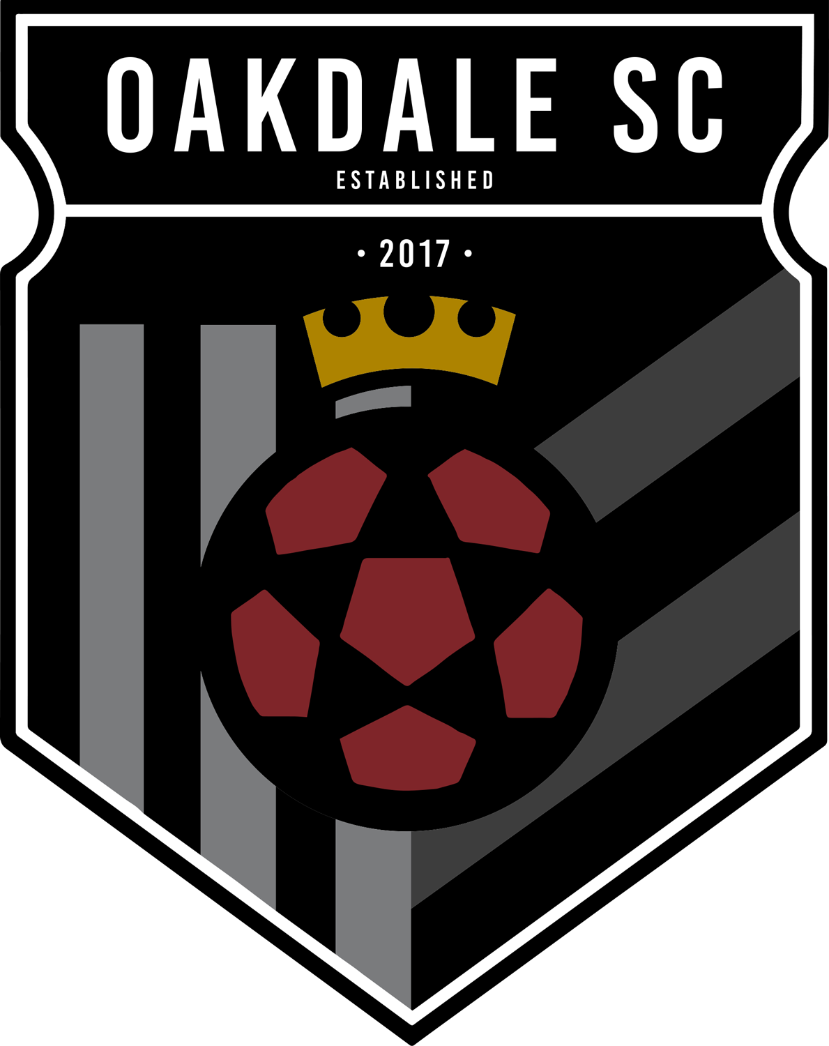 Logo for "OAKDALE SC" (est. 2017) featuring a crowned maroon soccer ball centered on a shield with black, white, and grey stripes.